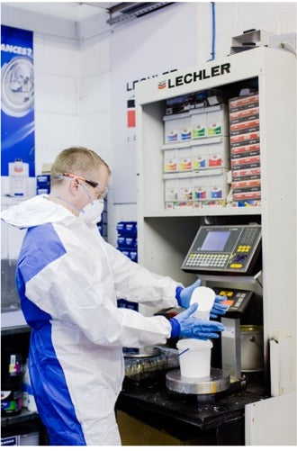 Paint tinters being weighed and mixed by Metalflake